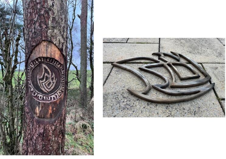 The Dark - tree carving and set decoration of "gate entrance" symbol