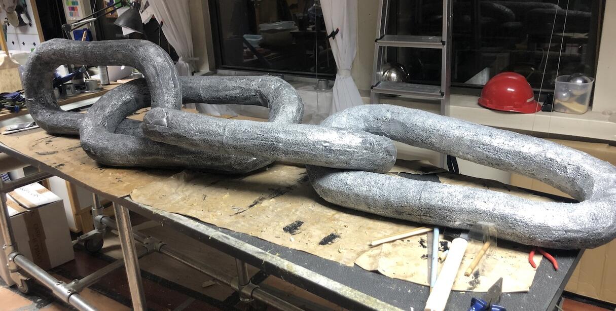 Adrenalism - Giant foam chain links for theatre show A Very Crypto Christmas